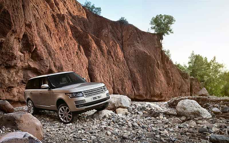 SUV on rocks